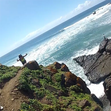 Hiking over a rocky stretch of beach