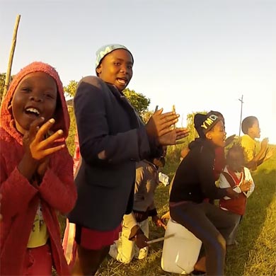 Xhosa children doing a traditional song and dance